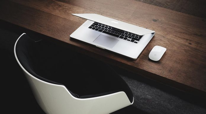 Kim Kardashian Shows Off Deep Cleavage In Plunging Top & Mini